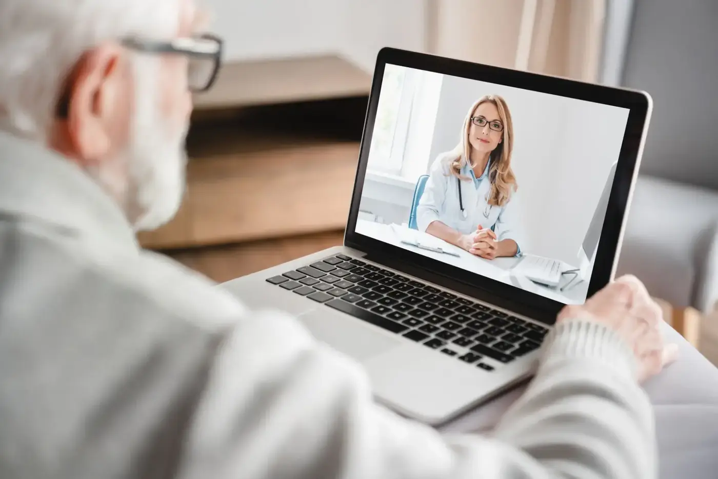 Older veteran joining an online group session from home
